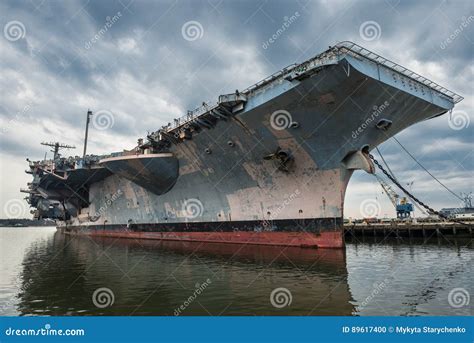 Aircraft Carrier In Port Stock Photo Image Of Seafront 99644348
