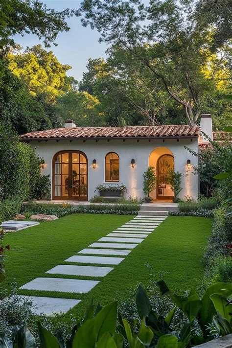 Charming Mediterranean House With Lush Green Garden And Arched Windows
