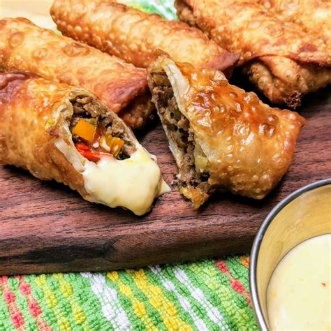 Philly Cheesesteak Egg Rolls With Mustard Cheese Dipping Sauce Philly Cheesesteak Egg Rolls With Mustard Cheese Dipping Sauce