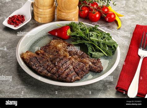 Premium Photo Grilled Chuck Roll Beef Steak With Arugula Premium Photo Grilled Chuck Roll Beef Steak With Arugula
