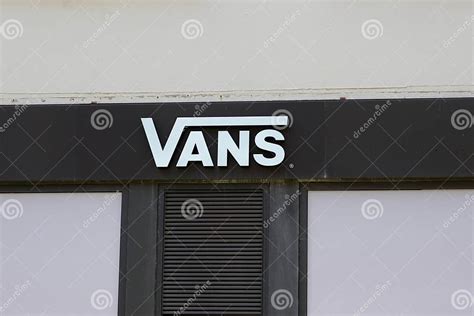 Vans Sign Text And Logo Brand Chain On Facade Store Wall Entrance Shop Vans Sign Text And Logo Brand Chain On Facade Store Wall Entrance Shop