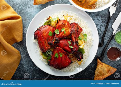 Whole Tandoori Chicken With Jasmine Rice Indian Food Stock Whole Tandoori Chicken With Jasmine Rice Indian Food Stock